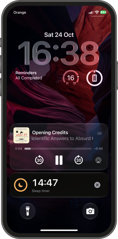 The Lock Screen, with Now Playing above a sleep timer Live Activity counting down from 14:47